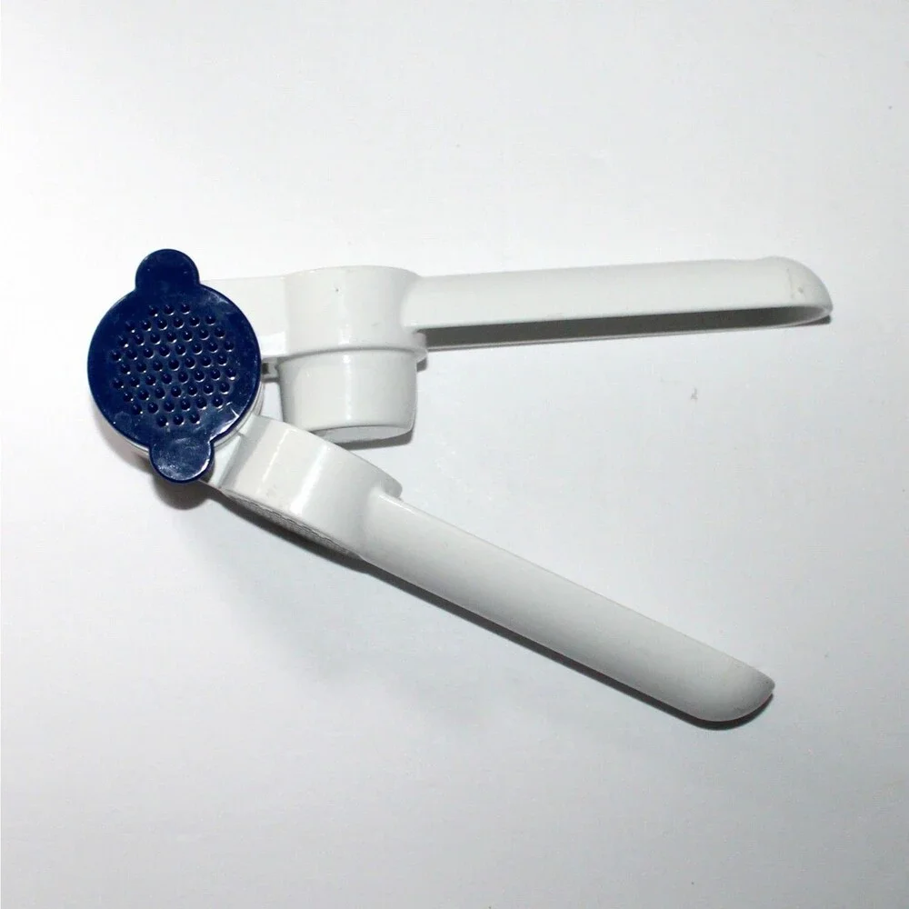 Tupperware Garlic Press with blue cleaning tool metal enamel white retro
